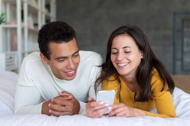 couple looking phone